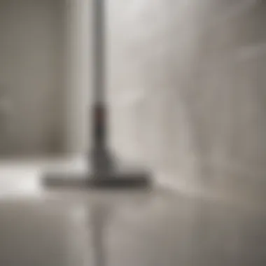 High-performance steam cleaner in action removing stains from bathroom tiles