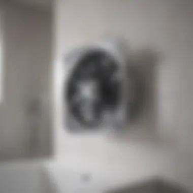 Installing a Chrome Exhaust Fan Installation of a chrome exhaust fan in a contemporary bathroom