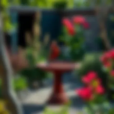A Serene Garden Featuring a Red Bird Bath Bowl A serene garden featuring a red bird bath bowl