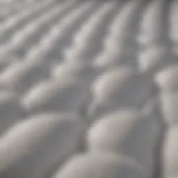 Close-up view of a puffy mattress cover displaying its texture and design