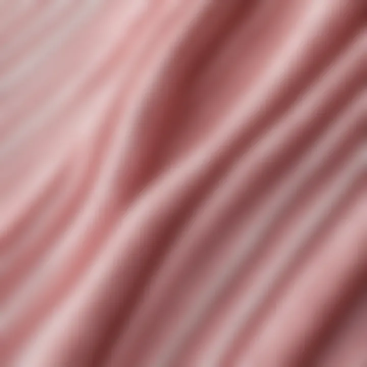 Close-up of soft pink and white striped towel texture