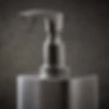 Close-up of a sleek stainless steel soap dispenser showcasing its finish