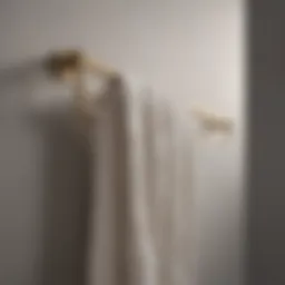Elegant satin gold towel rack enhancing bathroom decor