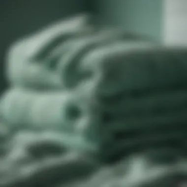 Close-up of soft texture of sea green bath towels showcasing material quality