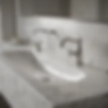 Modern Elegance in White Granite Elegant white granite bathroom countertop with modern faucets and accessories